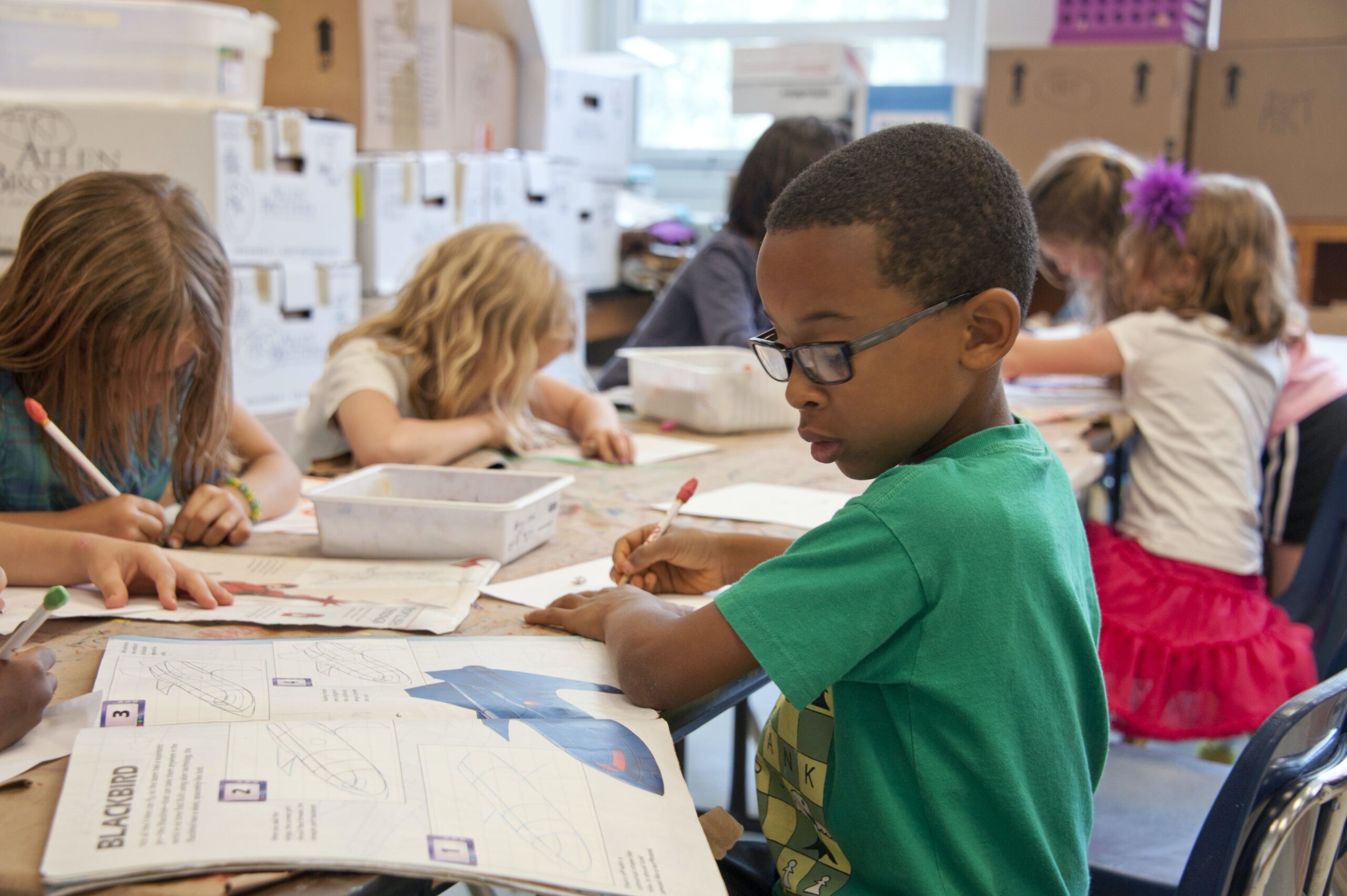 Classroom with young students depicting jobs that require a criminal record check