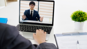 Candidate on laptop screen doing a virtual interview