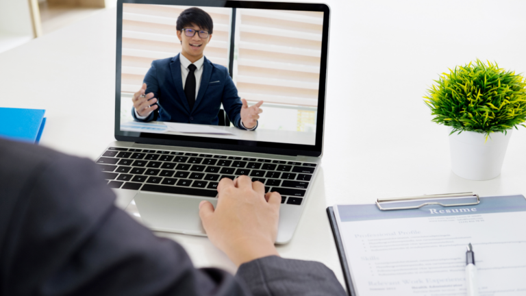 Candidate on laptop screen doing a virtual interview