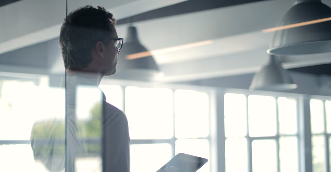 HR leader presenting to conference room about why background checks are important