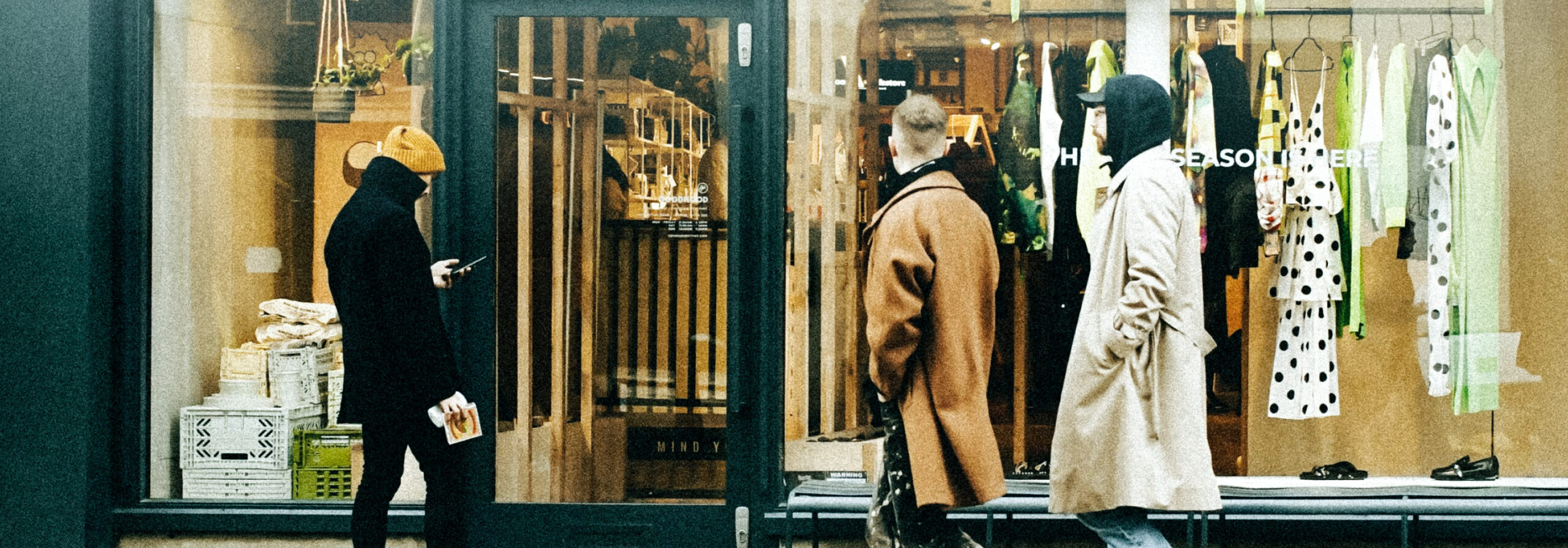 Employee working at retail counter in safe environment with retail background checks