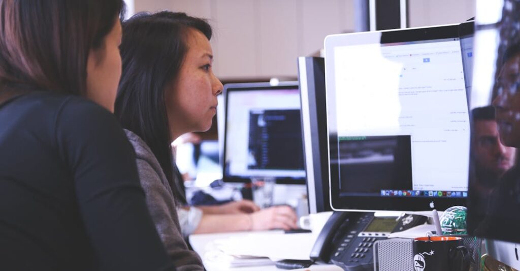 Office employees depicting the best background checks for staffing agencies