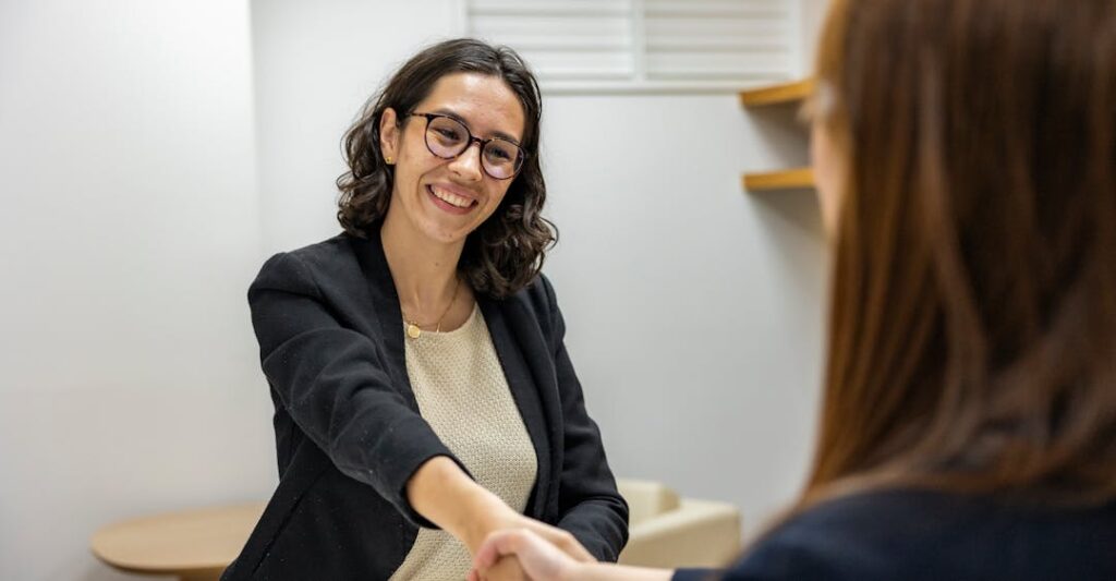 Job candidate in interview meeting with recruiter before background check process