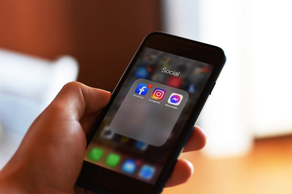 Person doing social media screening on their phone as part of a free background check Canada